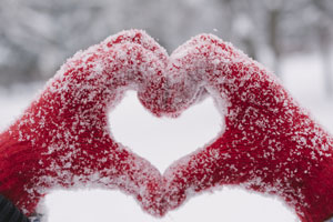 Snowy hands heart